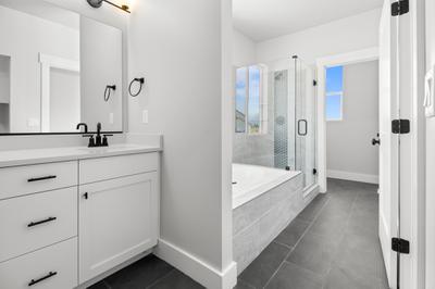 Get The Look: A Gorgeous Owner's Bath to a Cutler Home