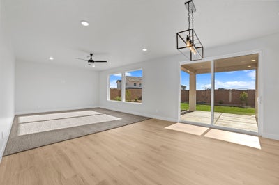 Great Room *Photos are representational of the floorplan only, NOT the specific listing. See Agent for more details*. 2679 W Lugano Way, St. George, UT