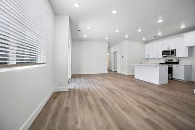 Great Room & Kitchen *Photo not representational of selections, only the floor plan. Contact agent for details*. New Home in St. George, UT
